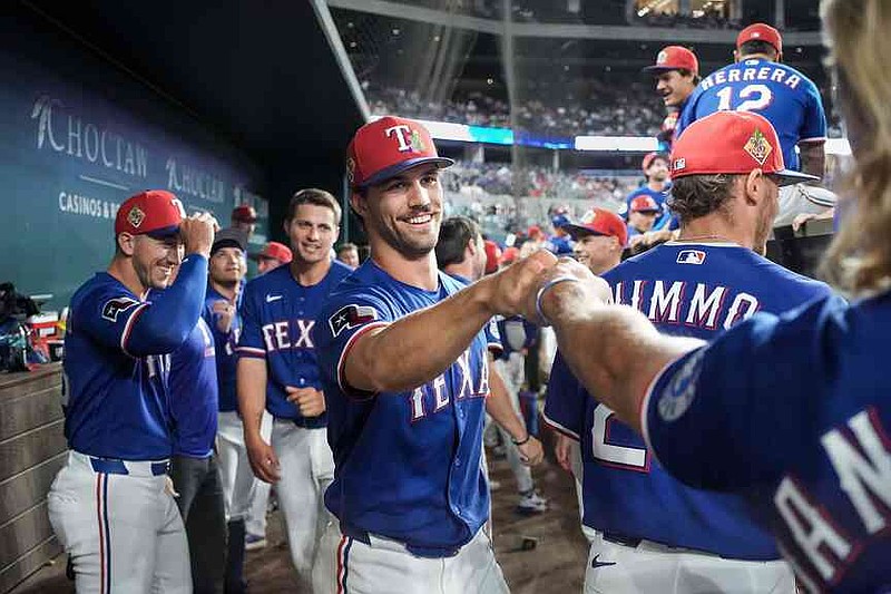 Texas rookie pitcher learns good news in mound visit | Northwest ...