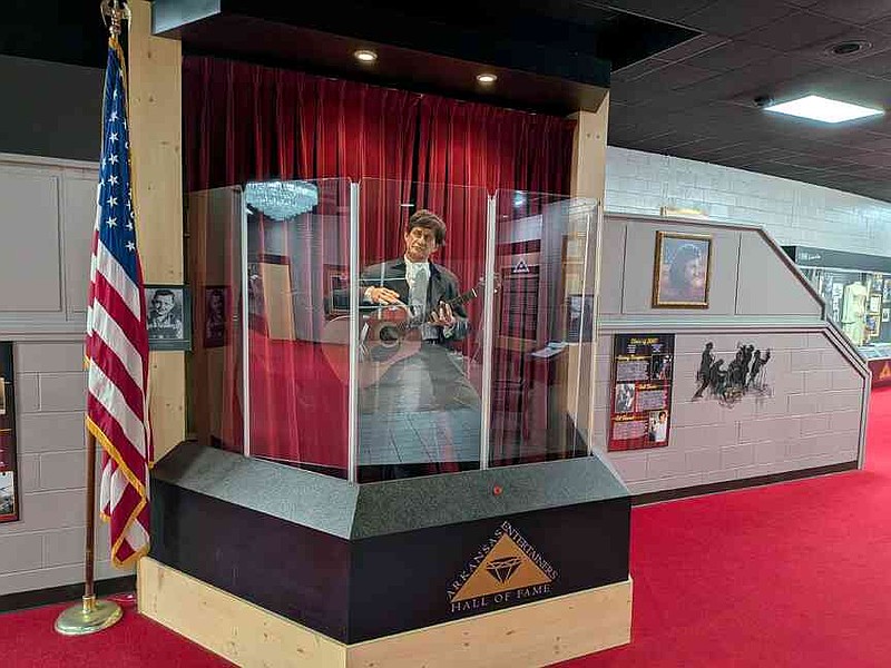 A wax figure of multi-genre recording artist Johnny Cash is stationed in the Arkansas Entertainers Hall of Fame at the Pine Bluff Convention Center on Tuesday, March 24, 2026. (Pine Bluff Commercial/I.C. Murrell)