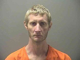 Man found sleeping in vehicle for sale arrested on drug, trespassing charges