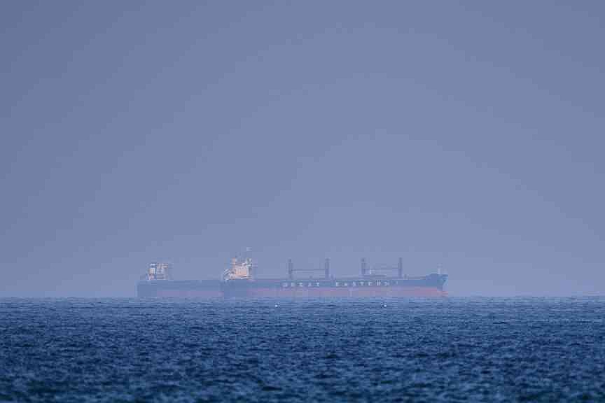 Iran orders Hormuz closed, fires on ships