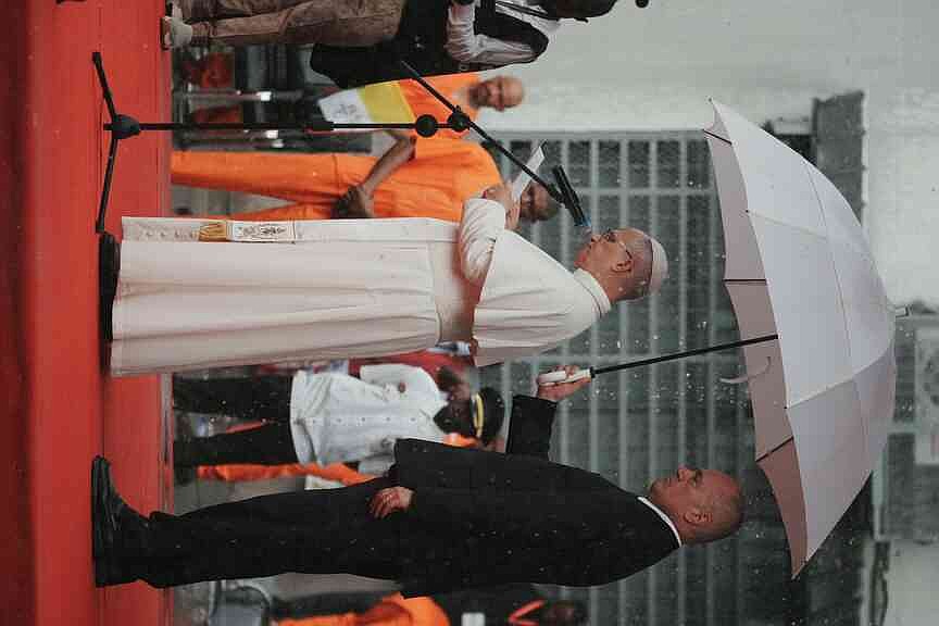 Pope visits prison at end of Africa tour