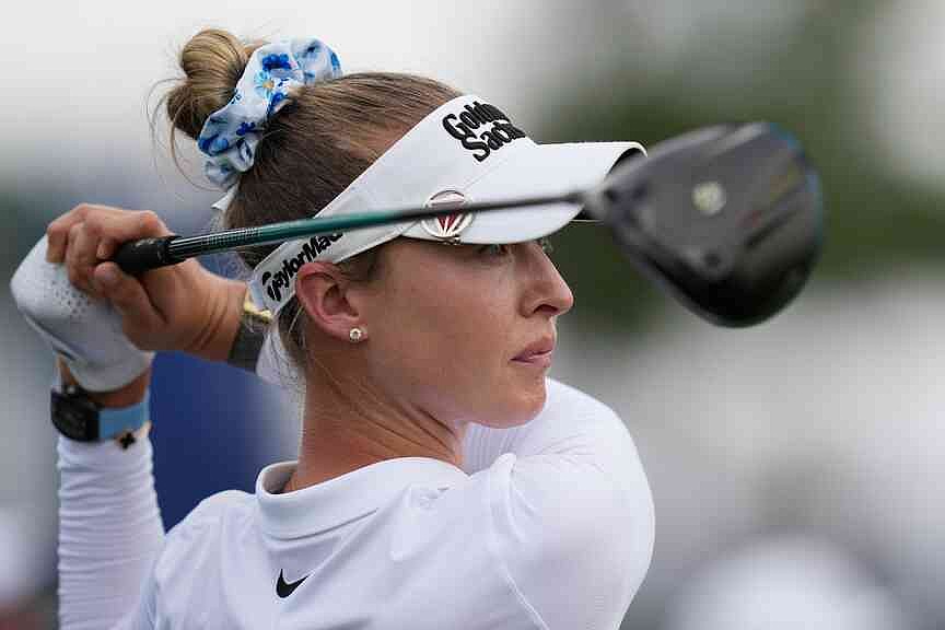 Korda plays bogey-free, tied for lead