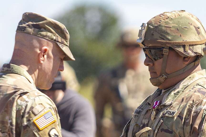 Four Arkansas National Guardsmen receive medals Thursday for actions taken during Monday accident at Fort Chaffee