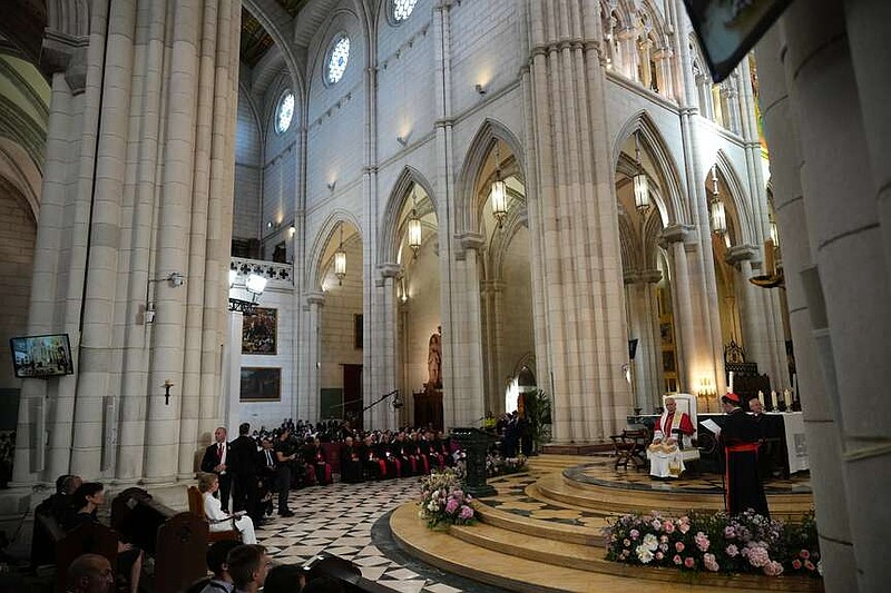 Pope Leo XIV, right, attends a prayer and devotion to our Lady of Almudena at the Cathedral of Holy Mary of Almudena in Madrid, Spain, Monday, June 8, 2026 (AP Photo/Alessandra Tarantino)