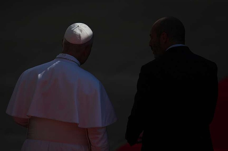 Pope Leo XIV, left, arrives at the Spanish parliament in Madrid, Spain, Monday, June 8, 2026. (AP Photo/Manu Fernandez)