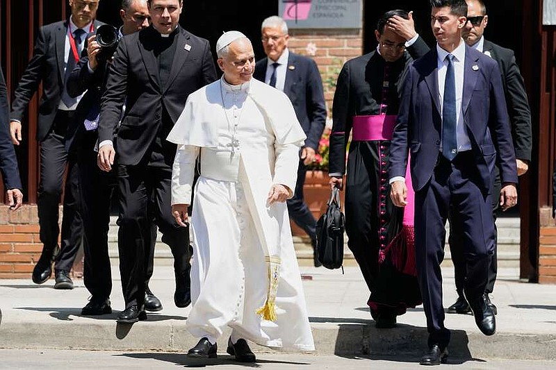 Pope Leo XIV leaves after meeting with Spain's bishops at the Spanish Episcopal Conference in Madrid, Monday, June 8, 2026. (AP Photo/Andrea Comas)