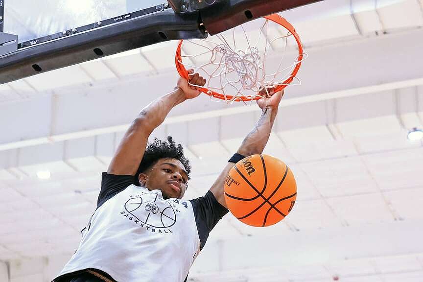 Trojans and Lady Wolves compete at ‘best team camp in the state’