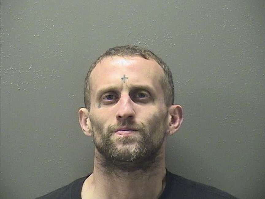 Man arrested after pursuit by Hot Springs police of alleged stolen vehicle left it totaled