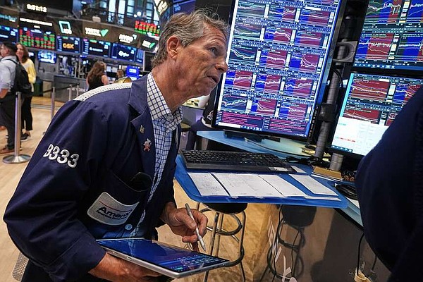 Oil costs' fall buoys Wall Street dragged by AI losses | Arkansas Democrat Gazette