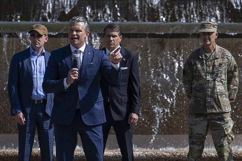 Defense Secretary Pete Hegseth speaks at Meridian Hill Park in D.C. on Thursday. Behind him, from left, are White House Deputy Chief of Staff Stephen Miller, acting attorney general Todd Blanche and Gen. Steven Nordhaus, chief of the National Guard Bureau. (Photos by Craig Hudson/For The Washington Post)