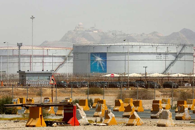 FILE - Storage tanks are seen at the North Jiddah bulk plant, an Aramco oil facility, in Jiddah, Saudi Arabia, on March 21, 2021. (AP Photo/Amr Nabil, File)