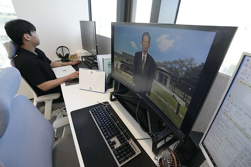 A computer screen as a video clip shows a digital portrait of Lee Kun-hee's late grandfather speaking at Vice, a technology company based in Seoul, South Korea, on Friday, June 12, 2026. (AP Photo/Ahn Young-joon)