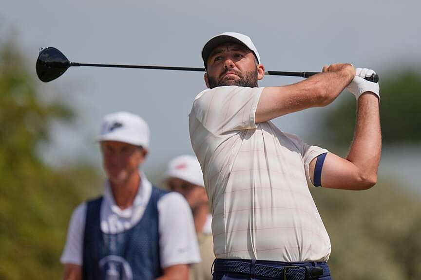 Scottie Scheffler gets bad bounces and a big break, adding to a close call at British Open