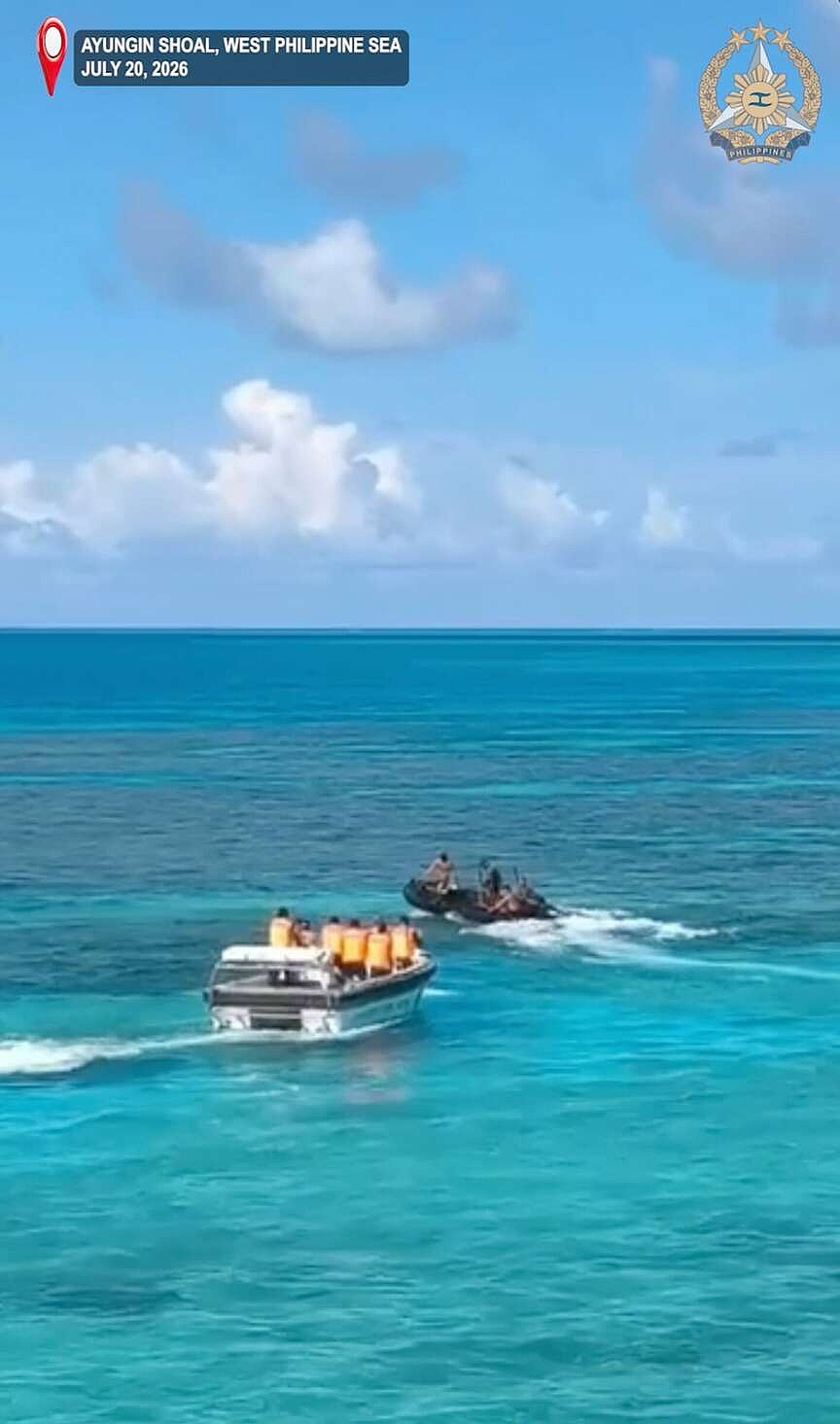 Philippines accuses China of injuring sailor in shoal spat