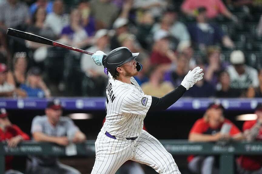 Rockies catcher trying hard to ignore rumors on trades