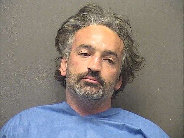 Probationer arrested after allegedly attacking girlfriend, fleeing, jumping into lake