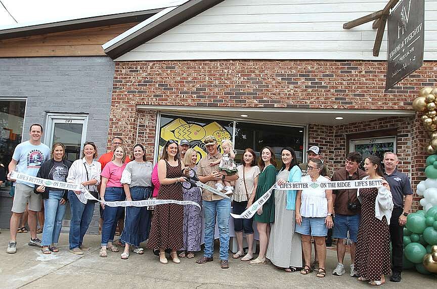 Vincents cut ribbon for new boutique