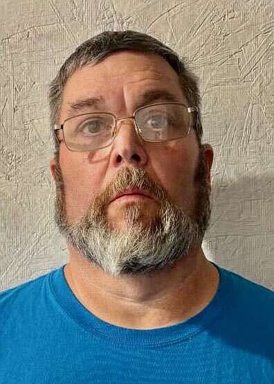 Release with electronic ankle monitor OK’d for former Arkoma police chief and teacher charged with touching minor students