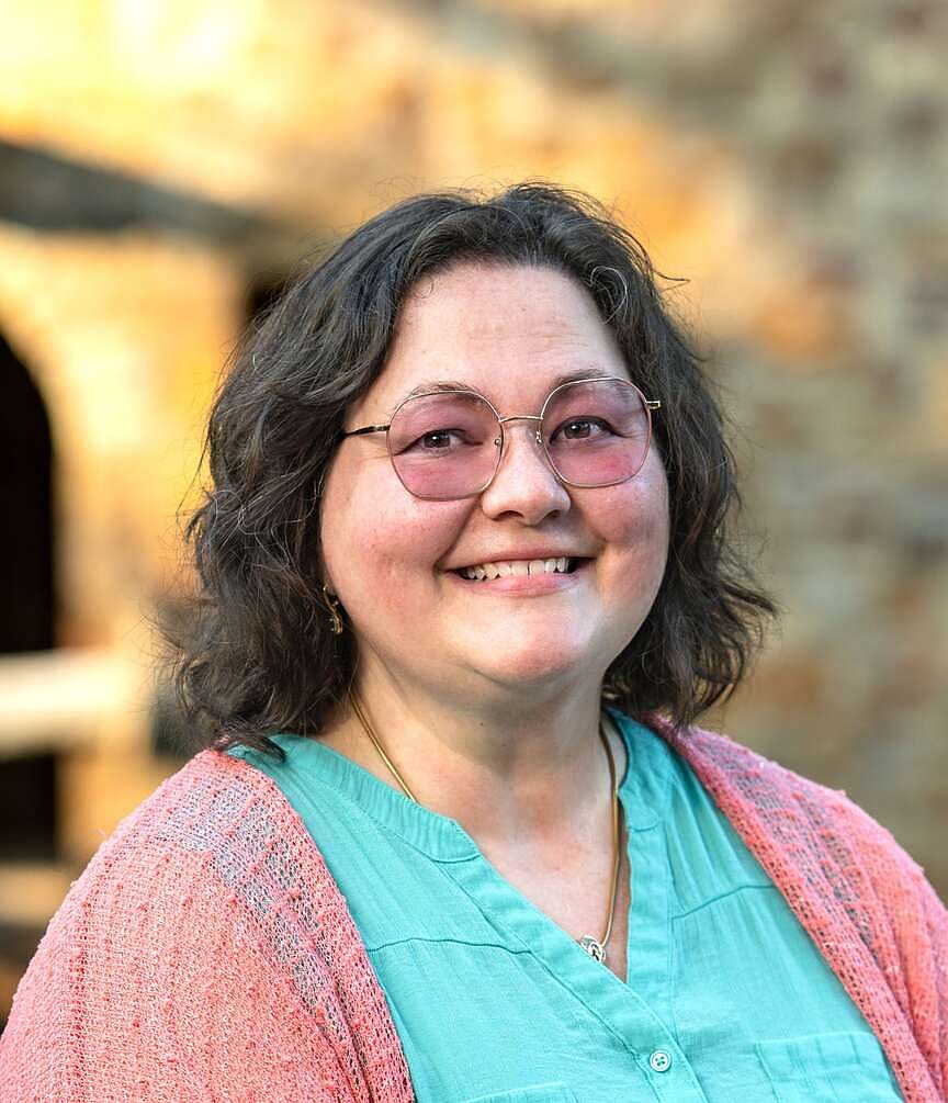 Arkansas author Kathleen Fuller reads from new novel during open crafting event at Yarn Alchemy in Bentonville