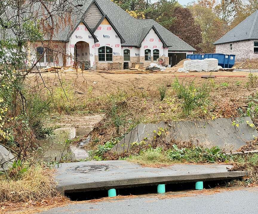 City defeats lawsuit before private parties settle over drainage onto 2 Fort Smith residential lots