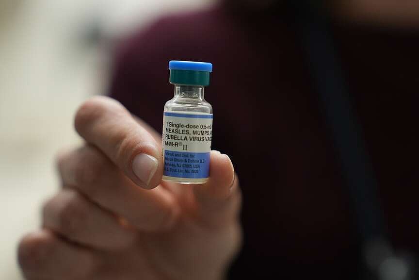 Report of 2 measles-related deaths sparks political clash