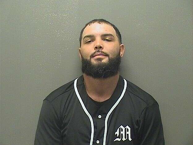 Hot Springs man arrested on warrants for alleged drive-by shooting, threats with firearm