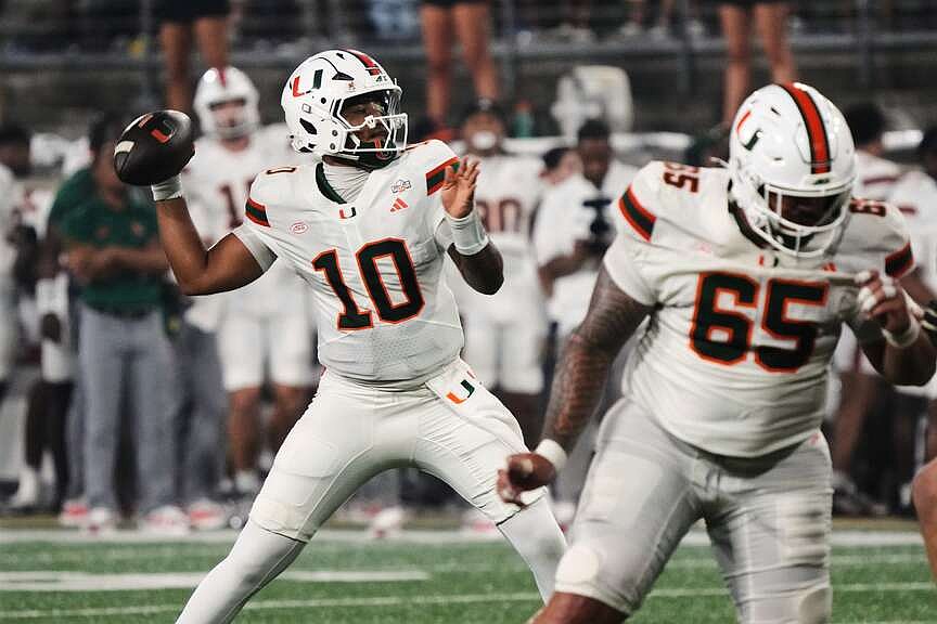 Photo: arkansasonline.com Miami Beats Wake Forest 33-20 as Darian Mensah Sets ACC Completion Records