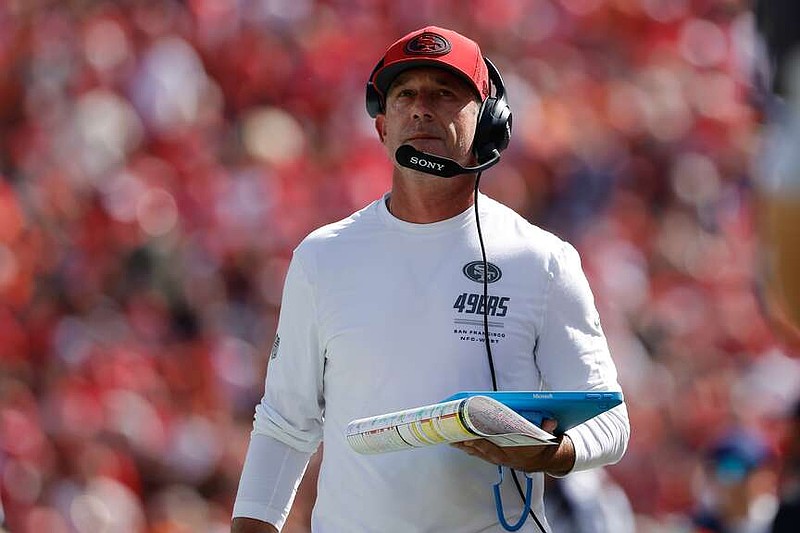 San Francisco 49ers head coach Kyle Shanahan walks on the sideline during the first half of an NFL football game against the Denver Broncos in Santa Clara, Calif., Sunday, Oct. 4, 2026. (AP Photo/Kelley L. Cox)