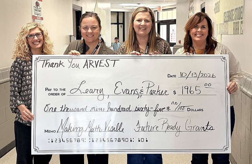 Teachers surprised with grant presentations
