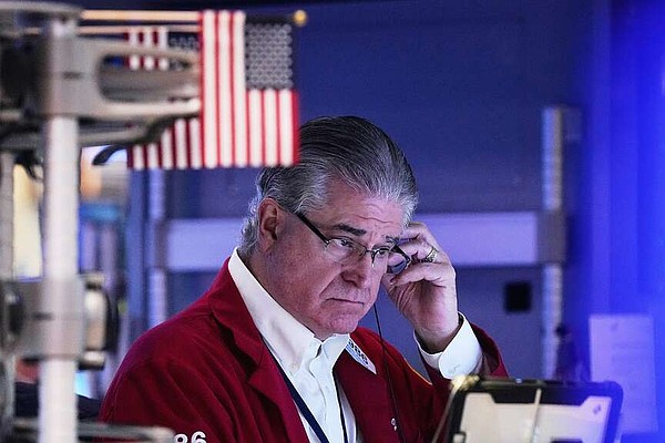 Stocks swing Wall Street closer to its record | Arkansas Democrat Gazette