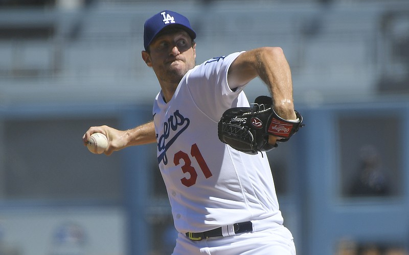 El abridor de los Dodgers de Los �ngeles Max Scherzer trabaja en el primer inning del juego ante los Padres de San Diego
