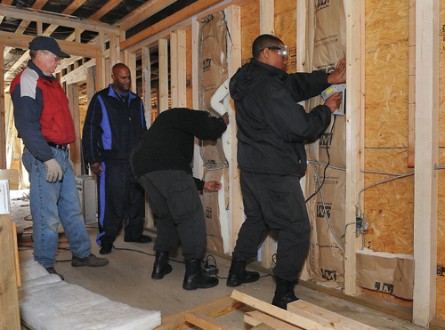 Volunteers work to remodel building as community center