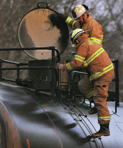 Firefighters stop leaking train car
