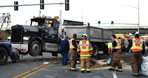 Truck overturns at I-530 near Olive Street