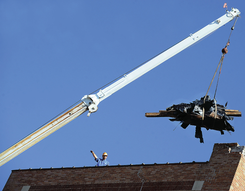 Officials: Main Saenger roof work complete, more needed