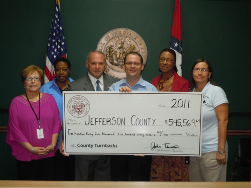 Commissioner presents check to Jefferson County officials
