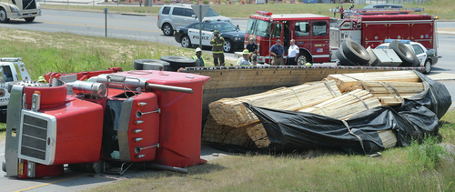 18-wheeler loses load, no one hurt at I-530 and Camden Road