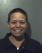 Woman charged with murder in June slaying