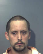 Sleeping man arrested on drug, gun charges