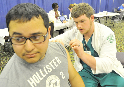 Hundreds turn out for mass flu shot clinic