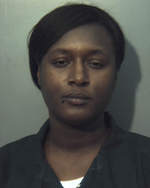 Woman arrested after allegedly trying to hit man with vehicle