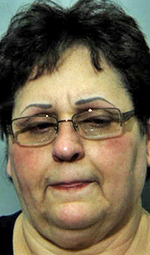 Reported armed disturbance leads to woman’s arrest