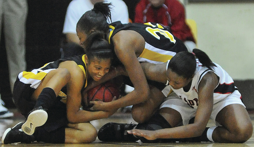 Lady Wildcats claw out win at White Hall