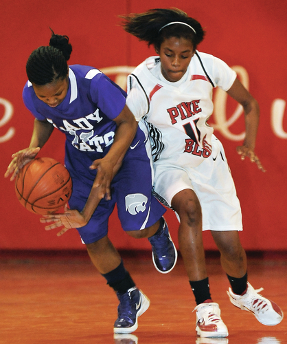 Lady Cats pull out win in conference tussle