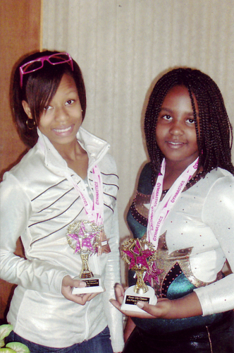 Sisters Advance to State Gym Meet