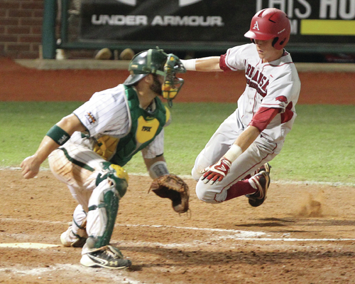 Philosophy change carries Razorbacks
