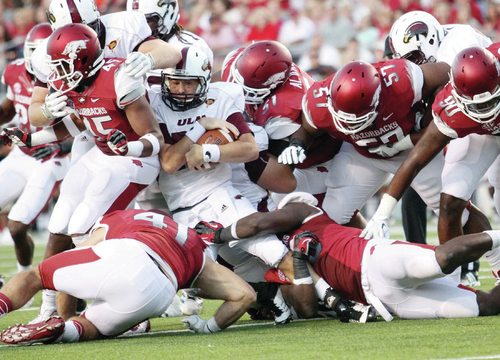 Razorbacks to stay course with defensive scheme
