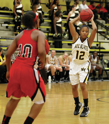 Lady Wildcats cruise to 10-point win