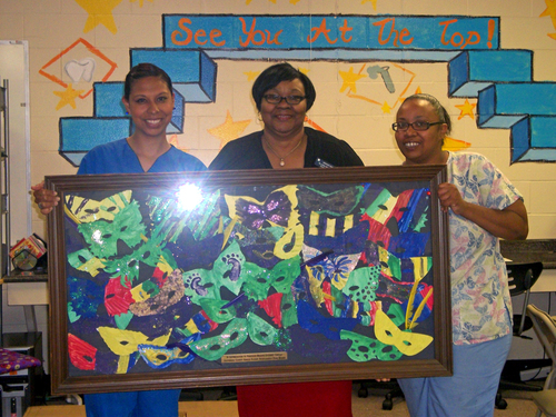 Single Parents Scholarship board presents mural to center