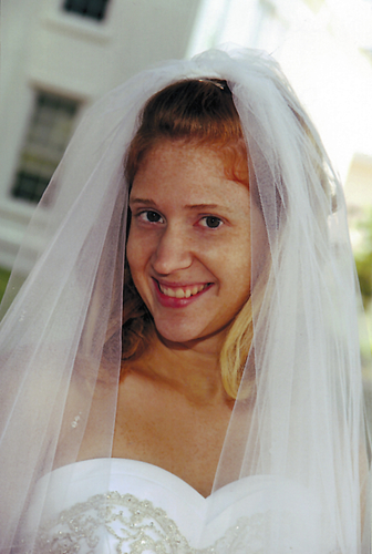Mallory Oliver and Joshua Higgins exchange wedding vows